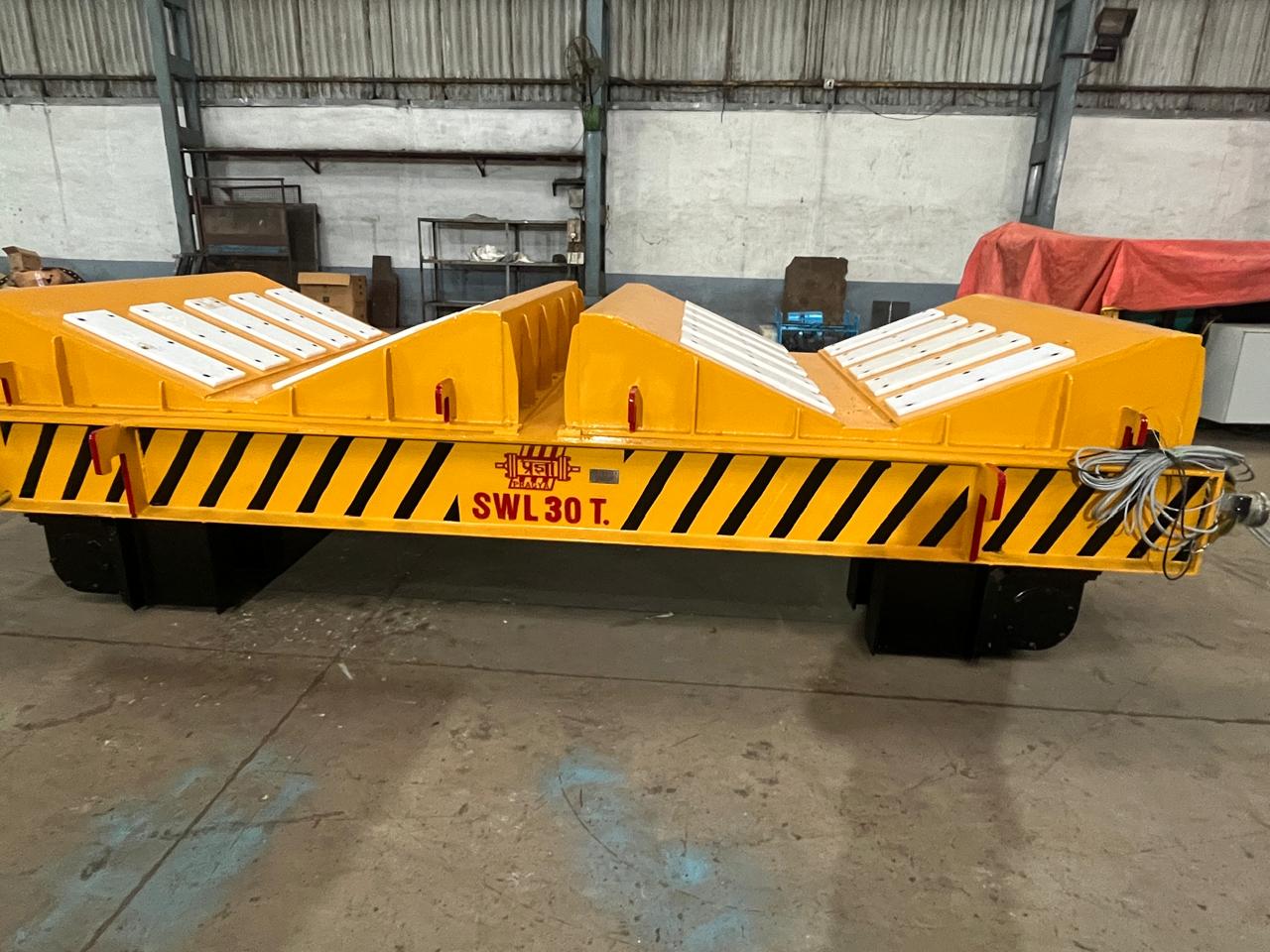 Motorised rail coil transfer trolley