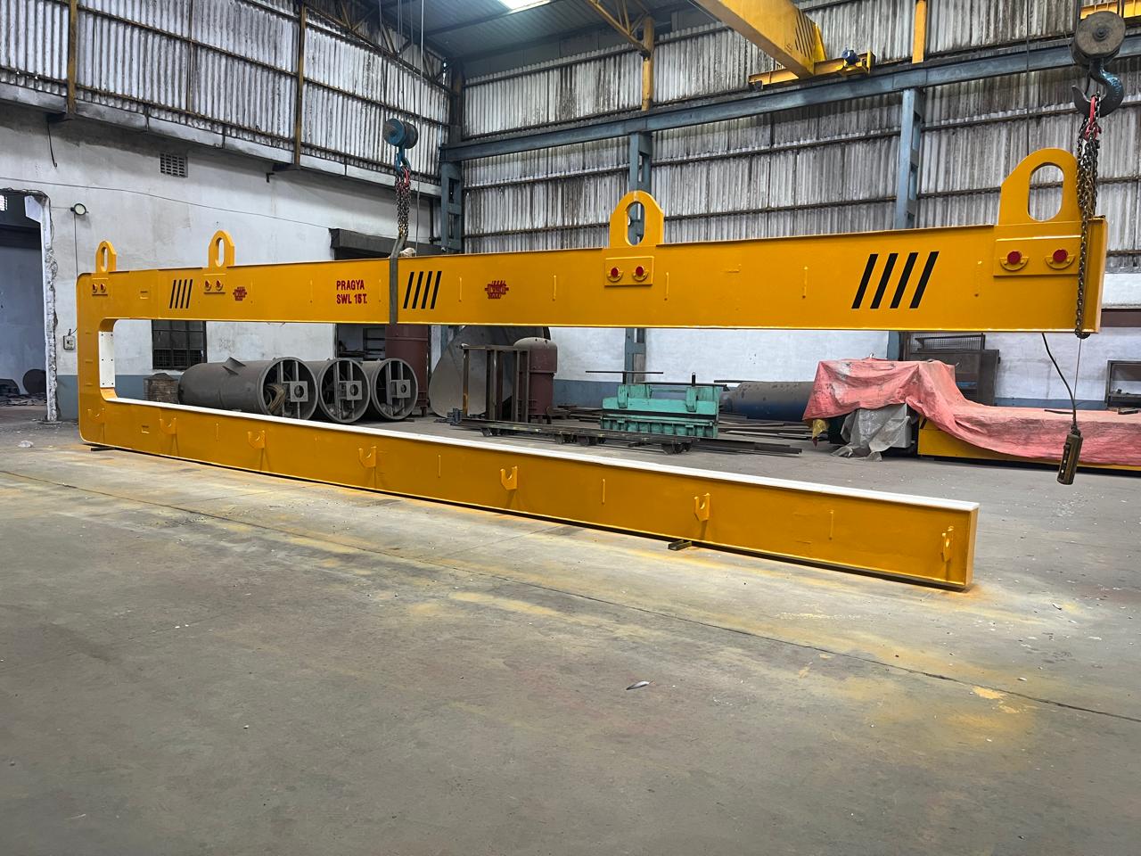 Full length side view of the pipe bundle hook — the container loading C hook in its cradle arm form