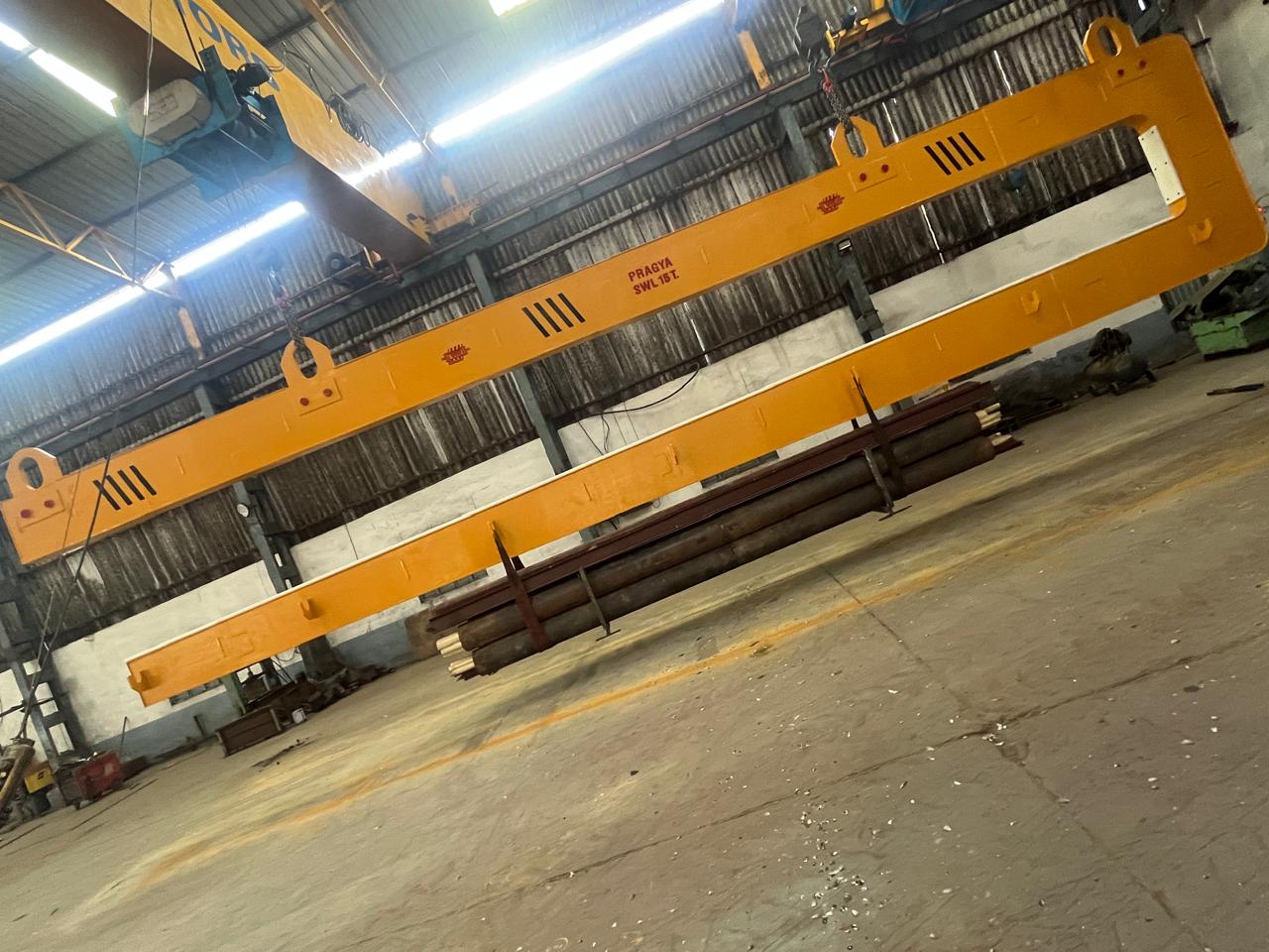 Pipe bundle hook — container loading C hook stencilled PRAGYA SWL 15 T with a V-notch cradle arm